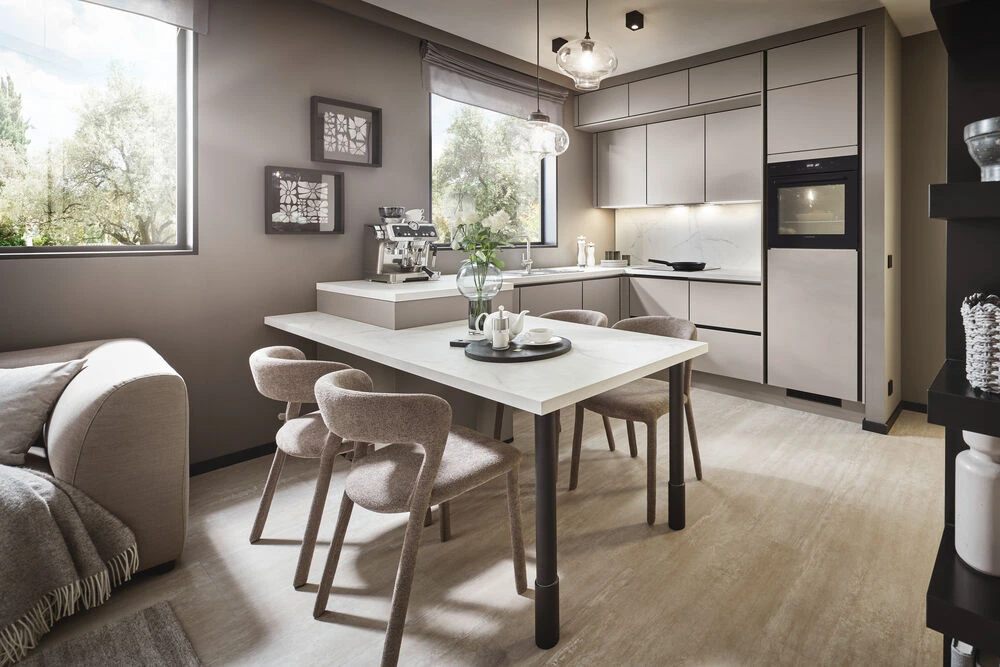 2. Zonenlicht → Pendelleuchten über Tisch, warmweiß, dimmbar Wohnküche mit Esstisch und Kochinsel | Offene Raumplanung mit Sichtverbindung zum Sofa | Zwei Pendelleuchten über Esstisch | Graue Küche mit Taupe-Fronten | Moderne Wohnküchen-Ideen | LS Küchen Inspiration